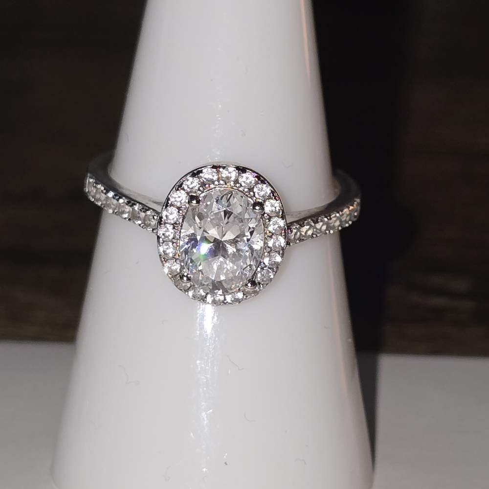 Elegant Silver Halo Ring with Pavé Accents